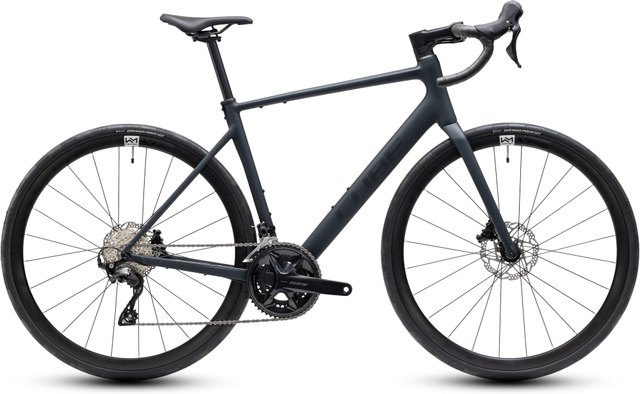 CUBE Attain SLX black and chrome endurance road bicycle, side view