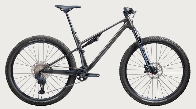 Norco Revolver C2 in Raw Black Carbon, drive-side view